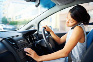 woman distracted driving