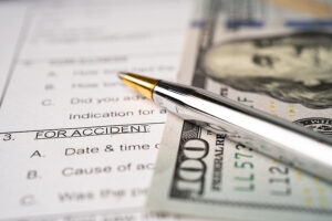 Who Pays When You Sue After a Car Accident?