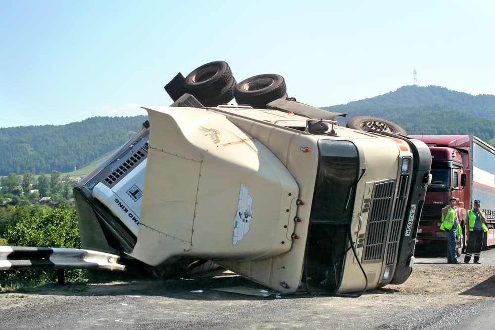 Severe truck collision on the freeway, depicting a serious road accident.