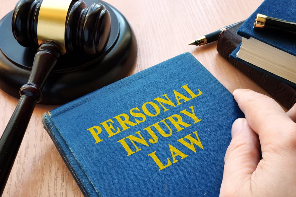 Symbolizing justice and personal injury law, a gavel rests on a desk, representing legal advocacy for those injured.